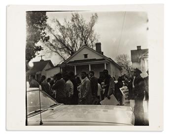 (MARTIN LUTHER KING.) Group of snapshots depicting a 1965 visit from King, and the 1968 Memphis march in his honor.
